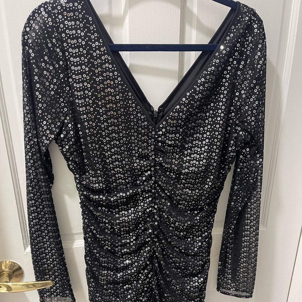 Beautiful black dress for a special occasion fits like a glove!!Guess brand
